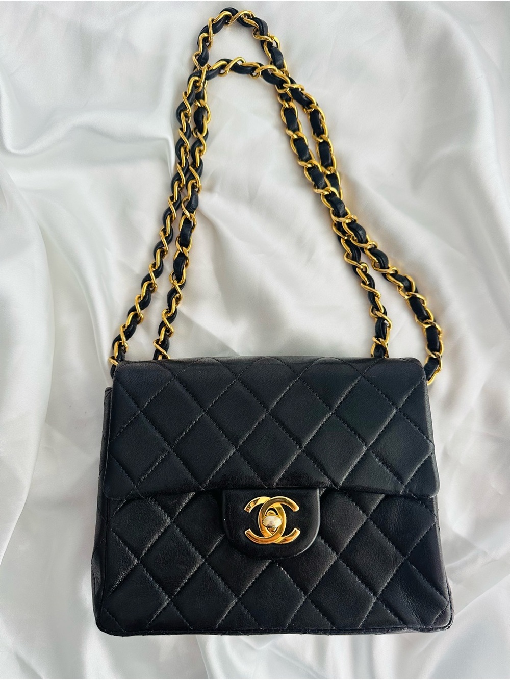 CHANEL Black Quilted square Lambskin Mini Flap Crossbody with Gold Chain